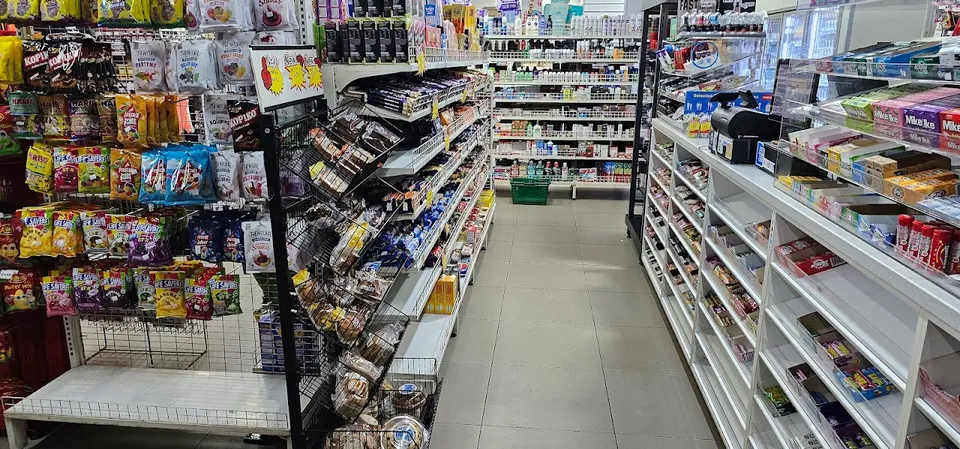 Inside Airport Supermarket — aisles stocked with groceries and international foods